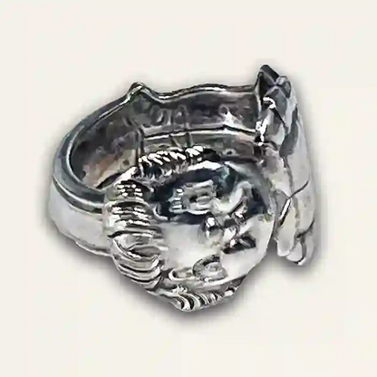 Campbell's Girl vintage silver-plate silverware spoon front view on neutral background