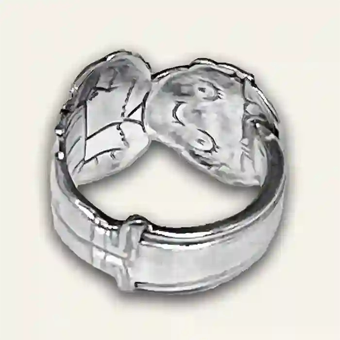 Campbell's Girl vintage silver-plate silverware spoon front view on neutral background