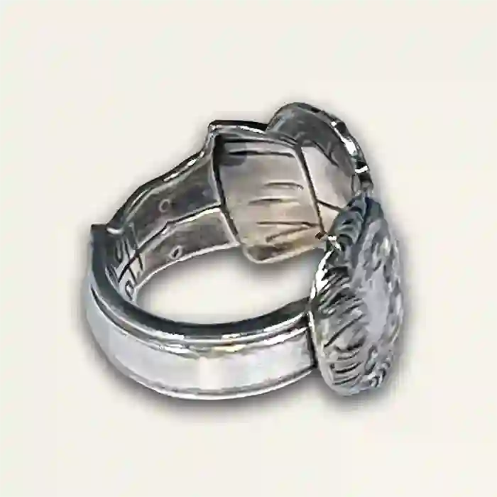 Campbell's Girl vintage silver-plate silverware spoon angled detail view