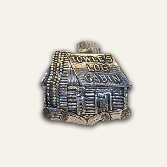 Vintage spoon ring made from a Towle’s Log Cabin silver-plate souvenir spoon.