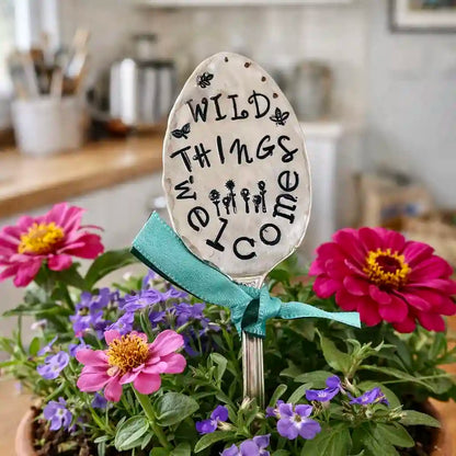 Wild Things Welcome stamped on silver plate spoon as garden marker