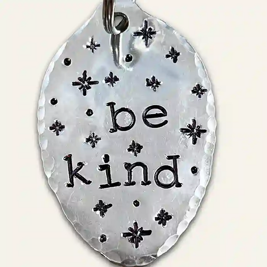Vintage silver-plate spoon keychain with the text 'Be Kind' hand stamped on it