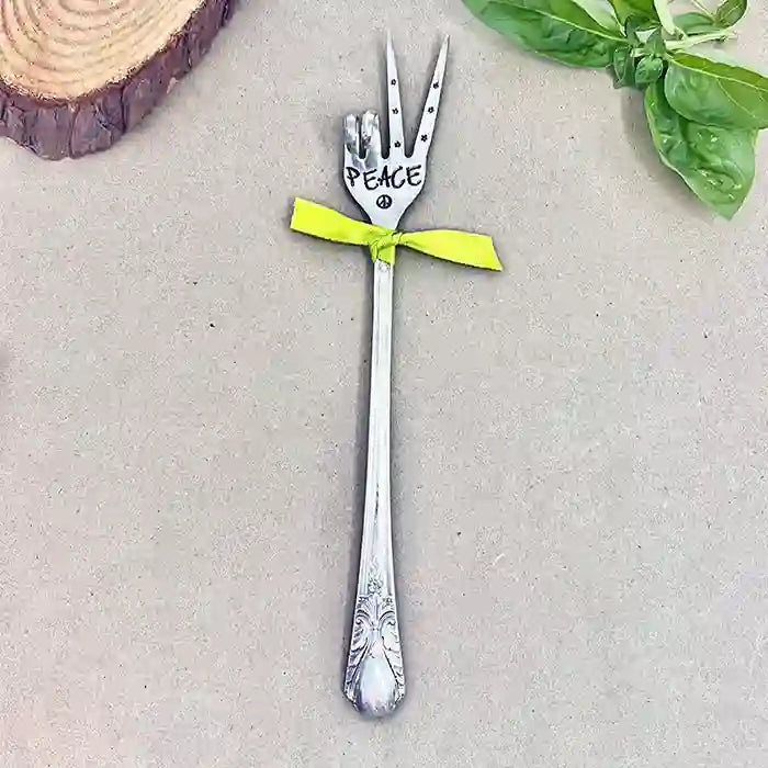PEACE fork (two-finger peace sign) with yellow ribbon made from vintage silver-plate flatware with wood and plant