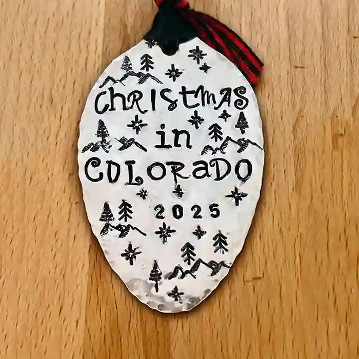 Christmas In Colorado 2025 silver-plate vintage flatware spoon ornament on wood