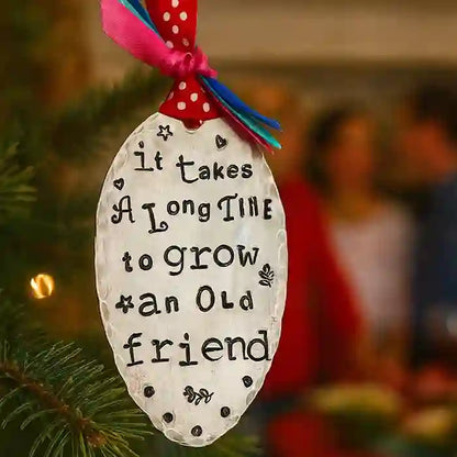 It Takes A Long Time To Grow An Old Friend vintage silver-plate silverware spoon ornament hanging from tree