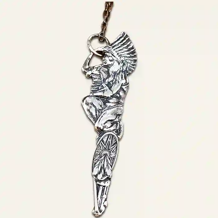 Silver-plate pendant of a stylized Native American figure made from a vintage souvenir spoon handle - backside