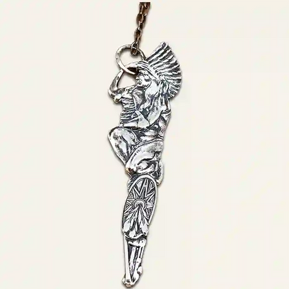 Silver-plate pendant of a stylized Native American figure made from a vintage souvenir spoon handle - backside