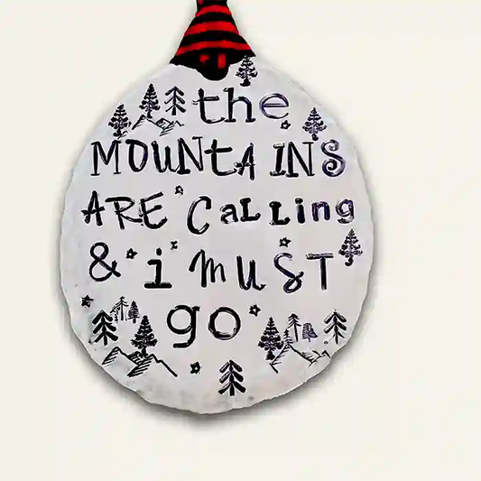 The Mountains Are Calling & I Must Go stamped into round vintage spoon making beautiful ornament