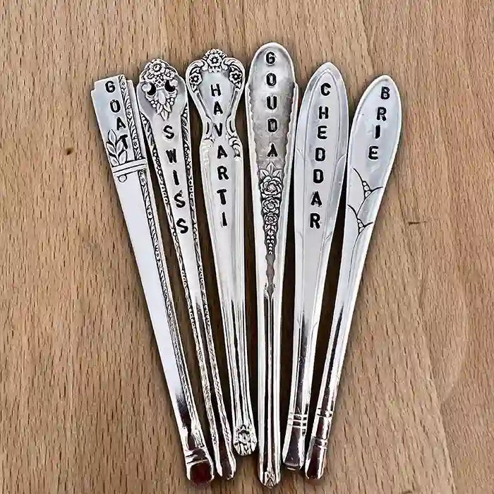 Goat, Swiss, Havarti, Gouda, Cheddar, and Brie Silver-plate Flatware Cheese Marker Gift Set on wood