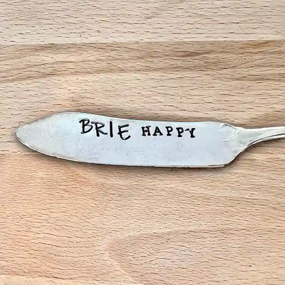 Brie Happy Vintage Silver-plate Cheese Spreader on wood background