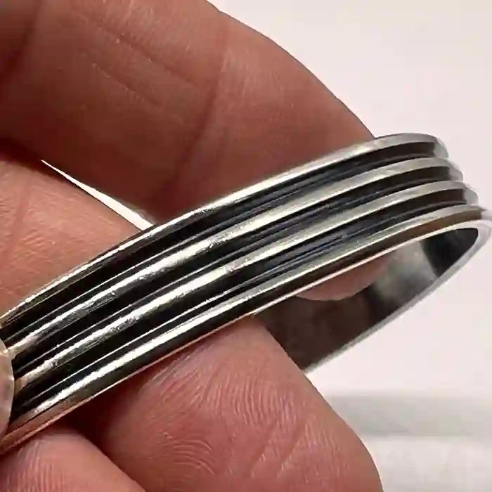 Sterling Silver bangle bracelet with three bands close up