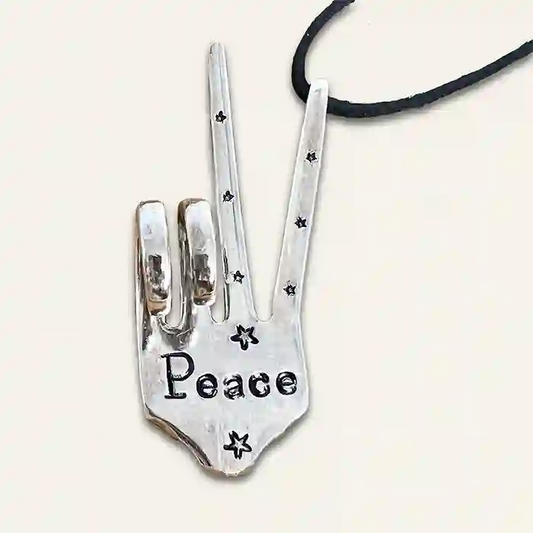 Peace Ornament (two-finger peace sign) made from vintage silver-plate fork