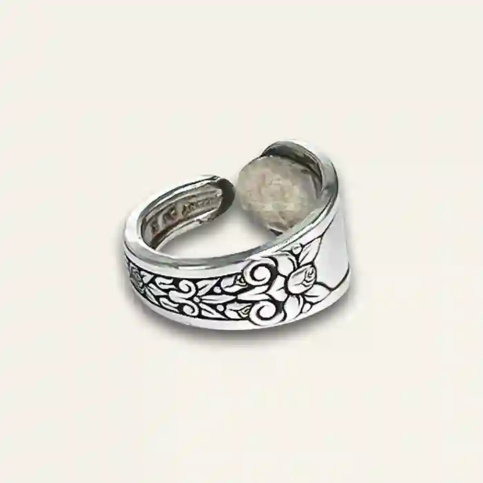 Handcrafted flatware ring featuring detailed silverware design