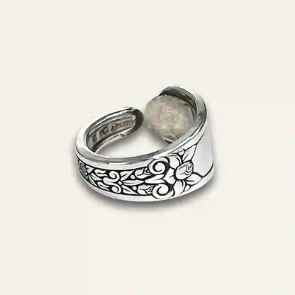 Handcrafted flatware ring featuring detailed silverware design