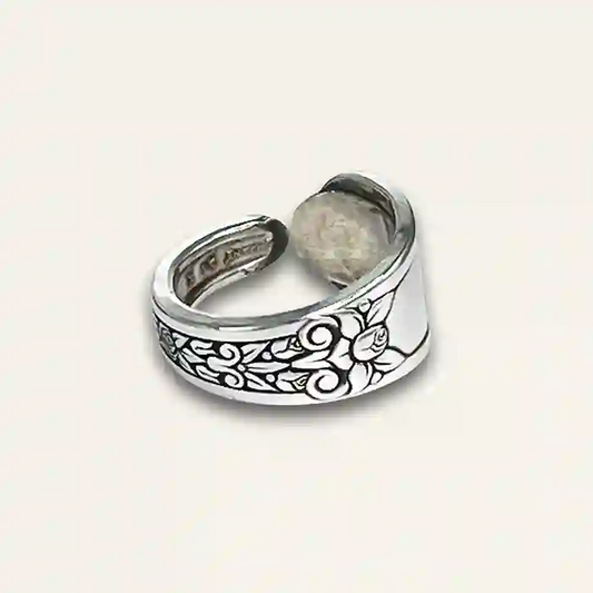 Handcrafted flatware ring featuring detailed silverware design