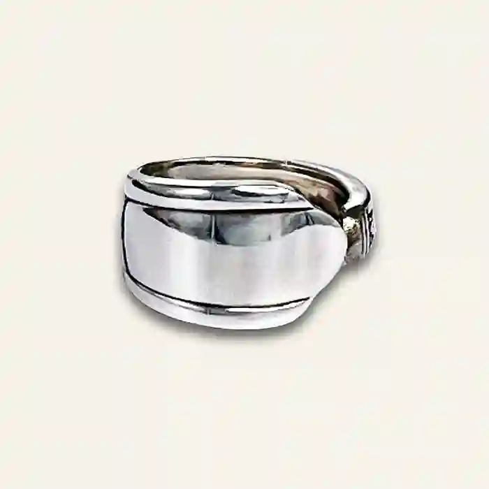 Silver spoon jewelry crafted from reclaimed flatware