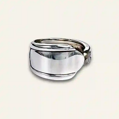 Silver spoon jewelry crafted from reclaimed flatware