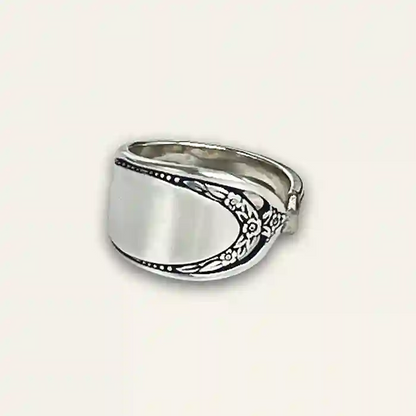 Hand-shaped vintage silverware ring with patterned band