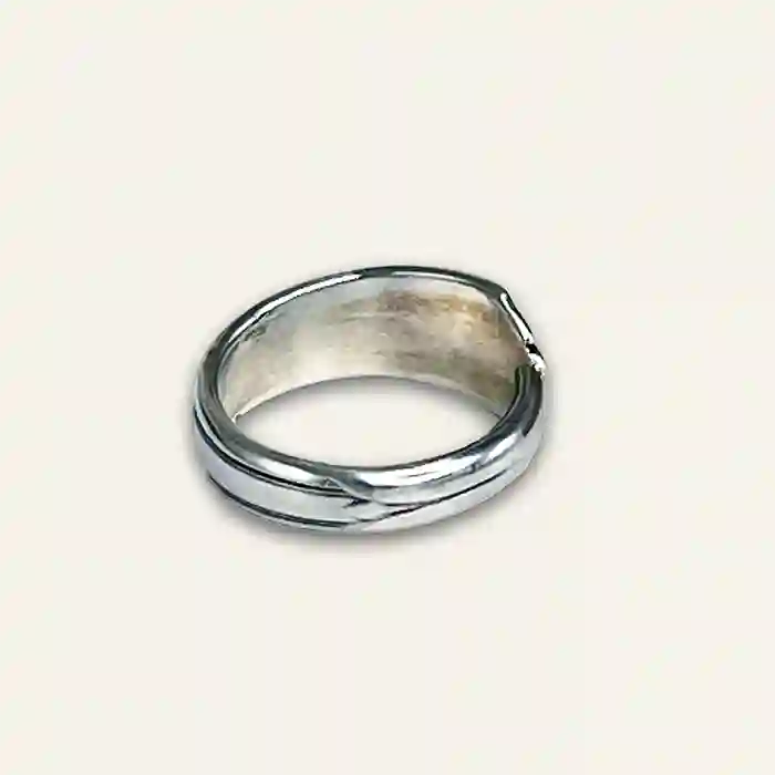 Hand-shaped spoon ring featuring antique silverware