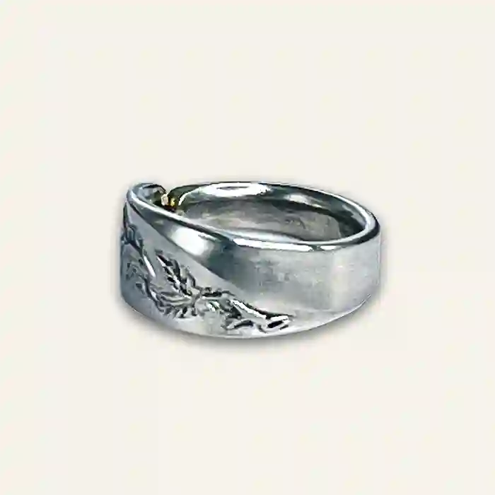Vintage silverware ring created from reclaimed spoons