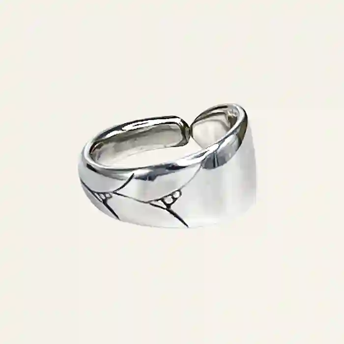 Curved-band spoon ring with antique silverplate pattern