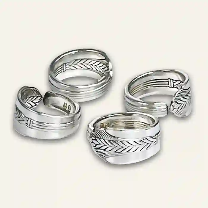 Artisan flatware ring created from reclaimed silverplate designs inside and out